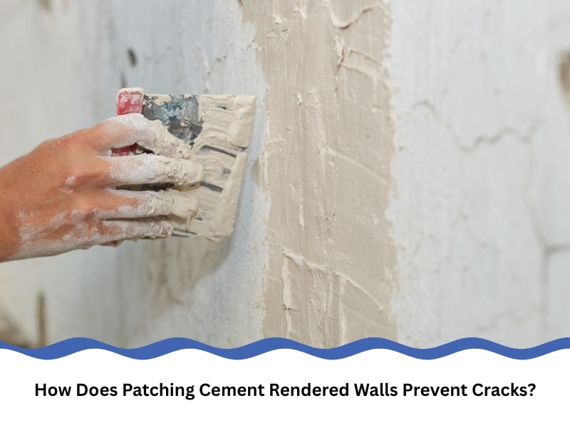 Hand applying patching cement rendered walls with trowel on damaged exterior surface