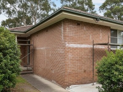 House exterior prepared for rendering after wall inspection and surface cleaning in Sydney